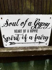 Hand-painted sign reading Soul of a Gypsy, Heart of a Hippie, Spirit of a Fairy